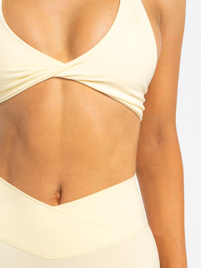 NKD Twist Sports Bra - Lemon Drop Clothing Ryderwear Staging AU